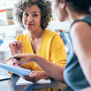 person talking to a financial advisor