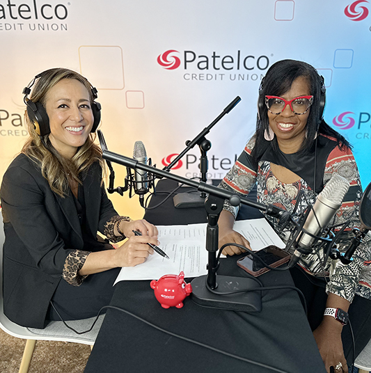 Patelco Employees Michele Enriquez, and Veronica Dangerfield at the podcast desk.