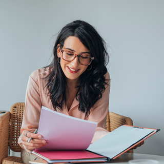 woman revising budget