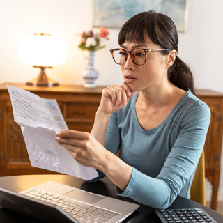 person looking at paper