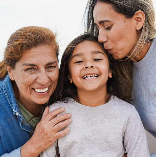 Three generations of Patelco members enjoying each other’s warm embrace