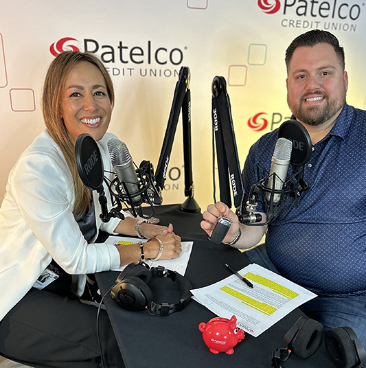 Patelco Employees Michele Enriquez and Ruben Gonzalez at the podcast desk.