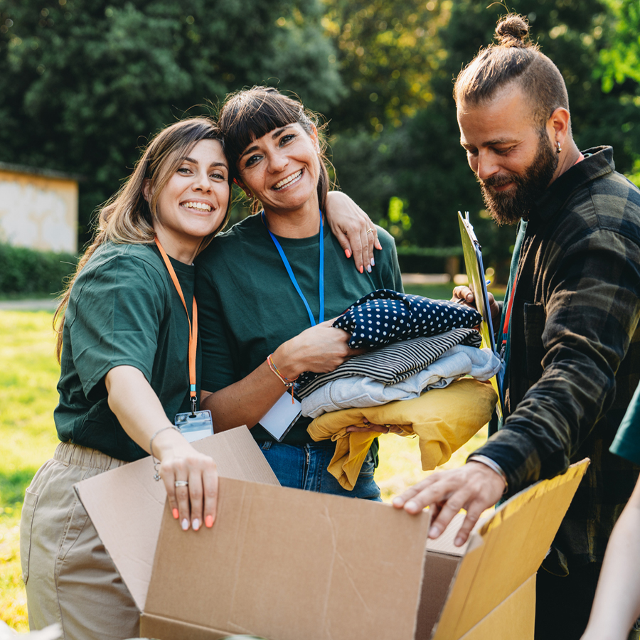 People in the community helping pack donated goods