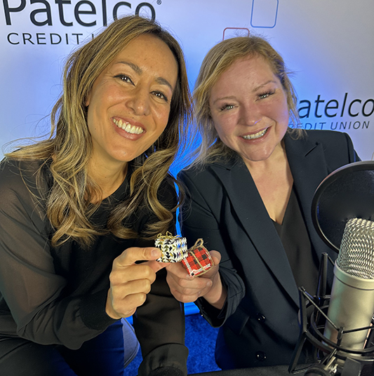 Patelco Employees Michele Enriquez and Tiffany Kiefer at the podcast desk.