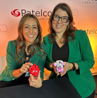 Patelco Employees Michele Enriquez and Kelley Young at the Podcast desk.